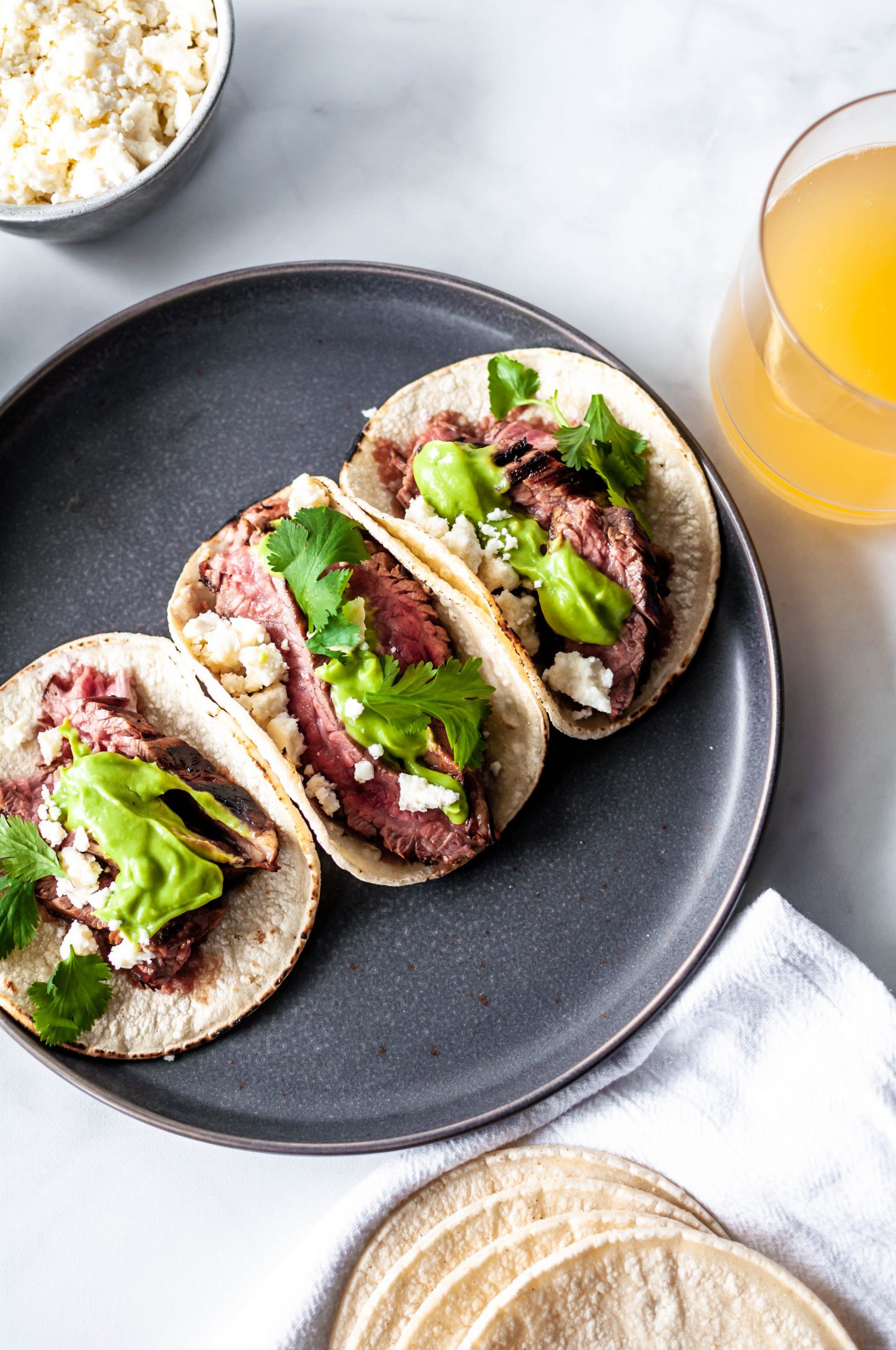 Steak Tacos With Avocado Crema & Queso Fresco