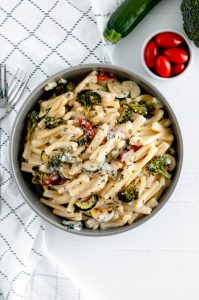 This Creamy Roasted Vegetable Pasta is a fast dinner option packed with flavor. Cheesy, creamy sauce, perfectly cooked pasta and flavorful roasted veggies.