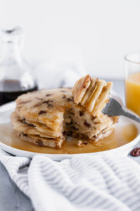 These Pecan Pancakes are the perfect combination of fluffy and crunchy. Rich, buttery toasted pecans tossed in my favorite pancake batter makes the most delicious Saturday morning breakfast.